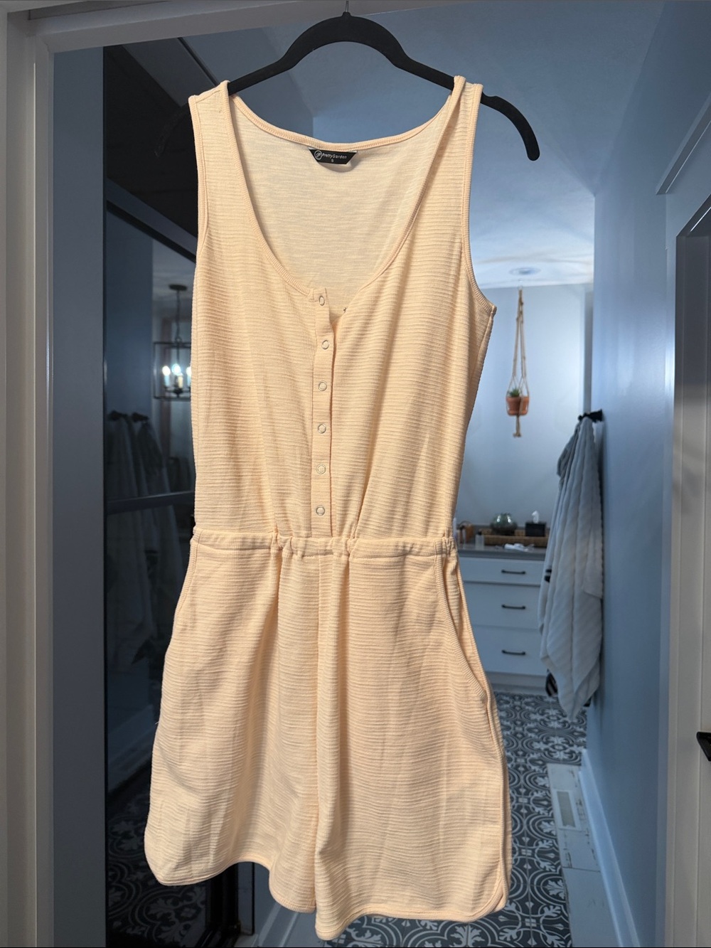 Sleeveless Button-Front Cream Romper